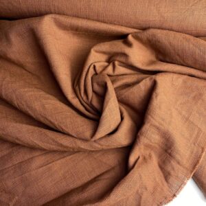 yazlık keten kumaş görseli -kiremit renk kumaş metreyle satın alınabilir